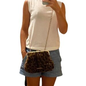 Enzo Angiolini faux  fur animal print crossbody bag.